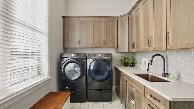4740 Edwardian Trce, Franklin, TN 37067 - laundry area featuring washing machine and dryer and cabinet space