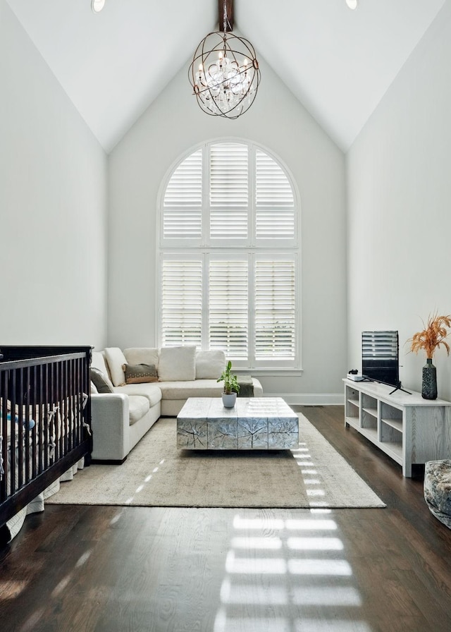 4740 Edwardian Trce, Franklin, TN 37067 - living room featuring a chandelier, high vaulted ceiling, plenty of natural light, wood finished floors, and baseboards