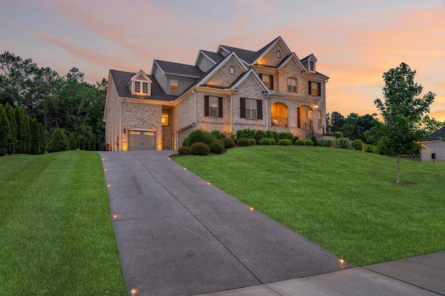 1931 Parade Dr, Brentwood, TN 37027 - craftsman house with concrete driveway, a lawn, an attached garage, and stone siding