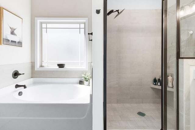 1013 Brightwood Ct, Clarksville, TN 37043 - full bathroom featuring a stall shower and a bath