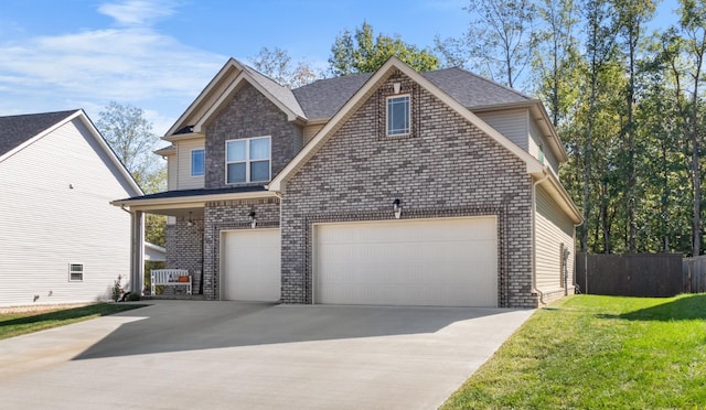 1013 Brightwood Ct, Clarksville, TN 37043 - view of front facade featuring concrete driveway, brick siding, an attached garage, and roof with shingles