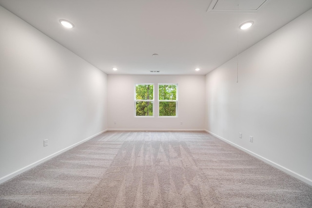 316 Deacon Ln, White House, TN 37188 - spare room with carpet, attic access, baseboards, and recessed lighting