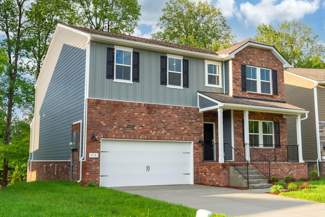 316 Deacon Ln, White House, TN 37188 - view of front of property with a garage, concrete driveway, board and batten siding, and brick siding
