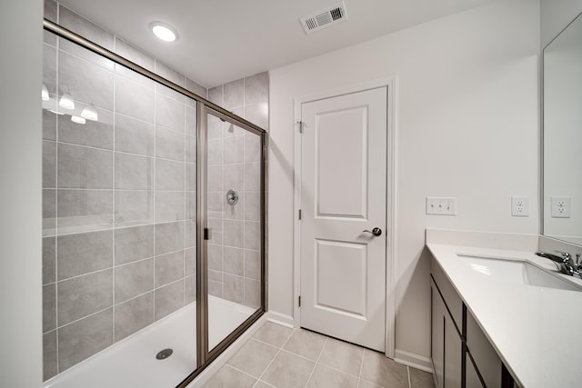 316 Deacon Ln, White House, TN 37188 - bathroom with a stall shower, tile patterned floors, and vanity