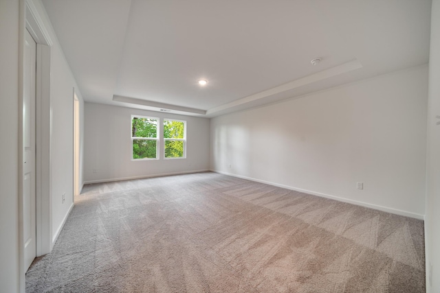 316 Deacon Ln, White House, TN 37188 - unfurnished room with a tray ceiling, carpet flooring, baseboards, and recessed lighting