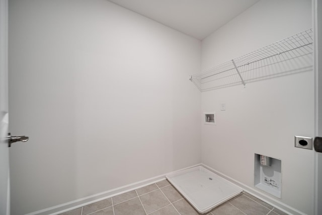 316 Deacon Ln, White House, TN 37188 - laundry room with hookup for a washing machine, hookup for an electric dryer, baseboards, and light tile patterned floors