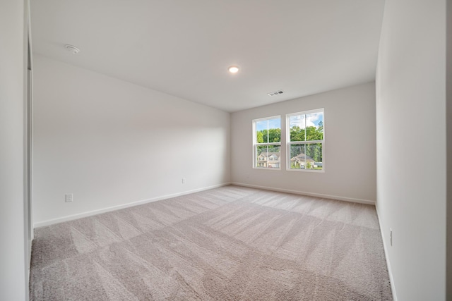 316 Deacon Ln, White House, TN 37188 - spare room featuring baseboards, light carpet, and recessed lighting