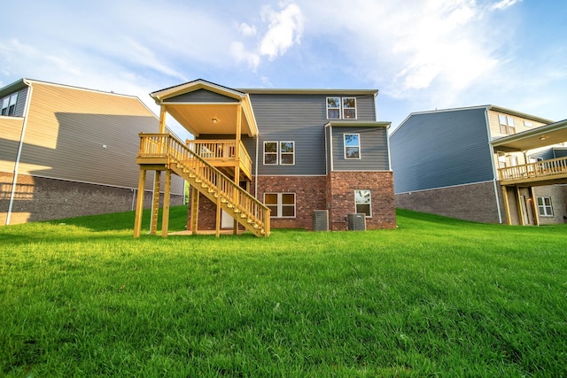 316 Deacon Ln, White House, TN 37188 - rear view of property featuring brick siding, stairway, a wooden deck, a yard, and cooling unit