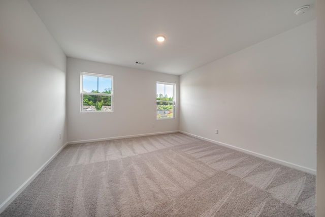 316 Deacon Ln, White House, TN 37188 - unfurnished room with light colored carpet, baseboards, and a smoke detector