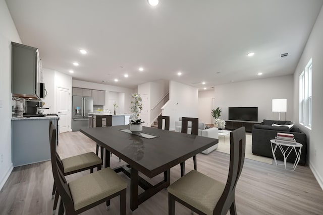 316 Deacon Ln, White House, TN 37188 - dining area with light wood-style flooring, recessed lighting, and baseboards