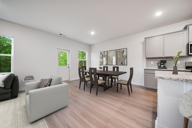 316 Deacon Ln, White House, TN 37188 - dining room featuring light wood-type flooring, recessed lighting, and baseboards
