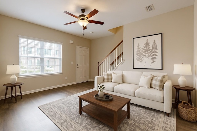 4117 Saddlecreek Way, Antioch, TN 37013 - living area with wood finished floors, a ceiling fan, stairway, and baseboards
