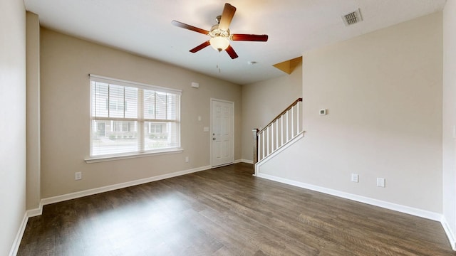 4117 Saddlecreek Way, Antioch, TN 37013 - foyer with dark wood-type flooring, stairs, ceiling fan, and baseboards