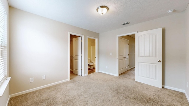 4117 Saddlecreek Way, Antioch, TN 37013 - unfurnished bedroom featuring light carpet, baseboards, and connected bathroom