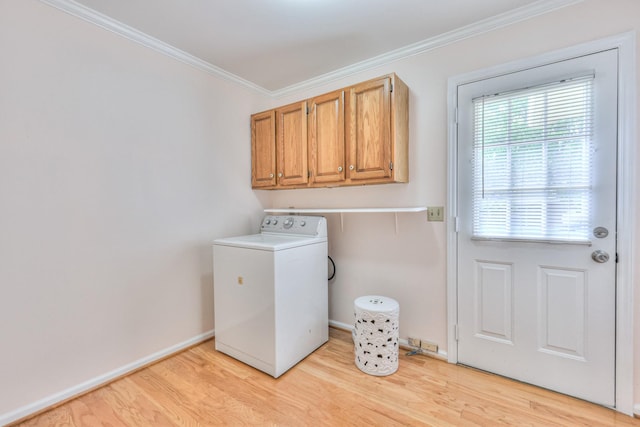 2519 Regency Park Dr, Murfreesboro, TN 37129 - washroom with washer / clothes dryer, crown molding, light wood-style floors, cabinet space, and baseboards