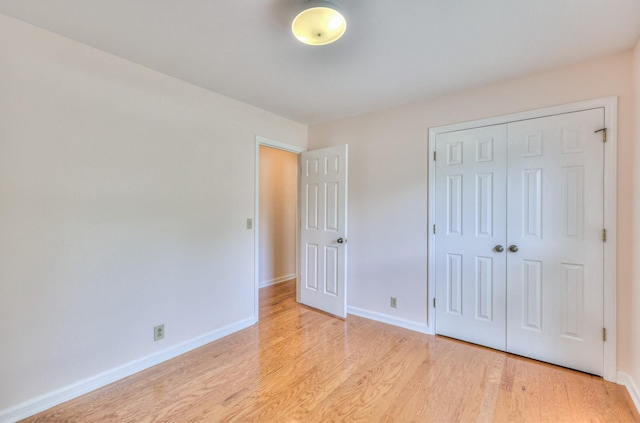 2519 Regency Park Dr, Murfreesboro, TN 37129 - unfurnished bedroom featuring light wood-type flooring, baseboards, and a closet