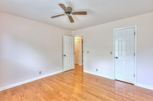 2519 Regency Park Dr, Murfreesboro, TN 37129 - spare room featuring light wood-style flooring, ceiling fan, and baseboards