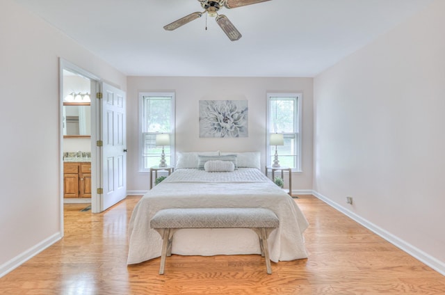 2519 Regency Park Dr, Murfreesboro, TN 37129 - bedroom with light wood-type flooring, baseboards, and ensuite bath