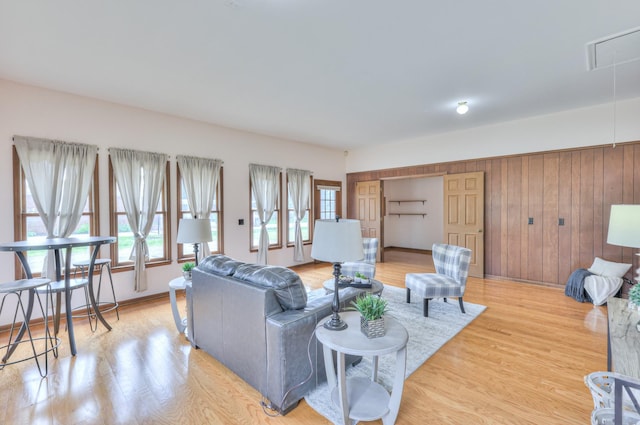 2519 Regency Park Dr, Murfreesboro, TN 37129 - living room with attic access, wood finished floors, and wood walls