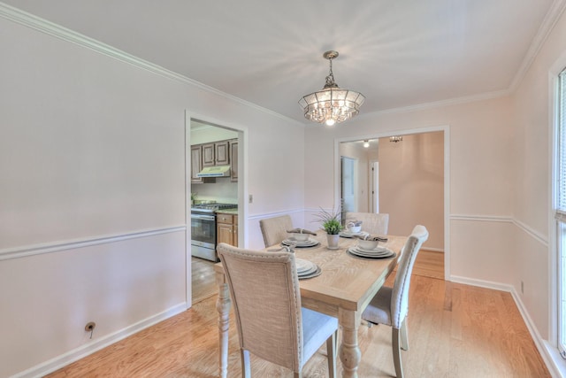 2519 Regency Park Dr, Murfreesboro, TN 37129 - dining area featuring a chandelier, light wood-style floors, ornamental molding, and baseboards