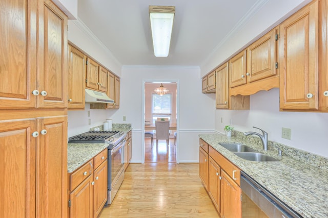 2519 Regency Park Dr, Murfreesboro, TN 37129 - kitchen with appliances with stainless steel finishes, a sink, under cabinet range hood, light wood-style floors, and crown molding