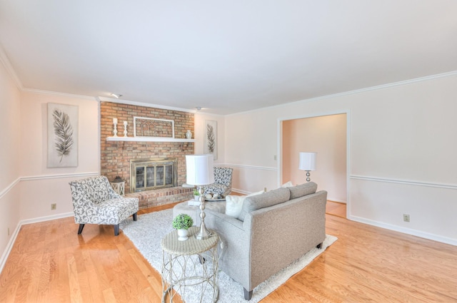 2519 Regency Park Dr, Murfreesboro, TN 37129 - living room featuring wood finished floors, ornamental molding, a brick fireplace, and baseboards