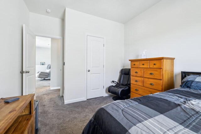 319 Petunia Dr, Smyrna, TN 37167 - carpeted bedroom featuring lofted ceiling and baseboards
