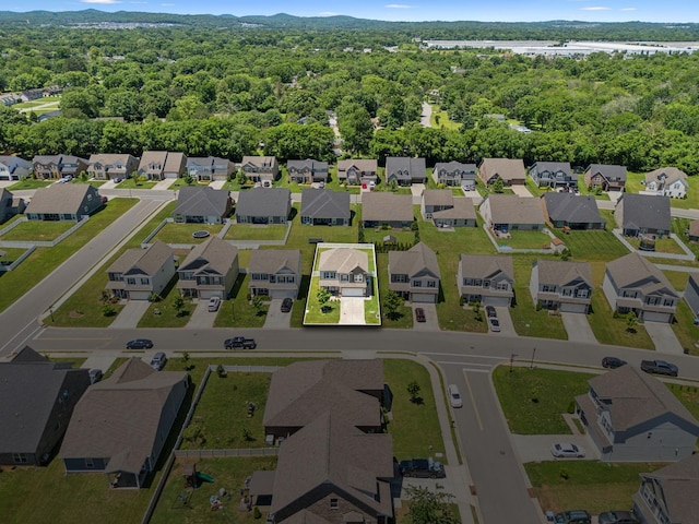 319 Petunia Dr, Smyrna, TN 37167 - aerial perspective of suburban area featuring a heavily wooded area