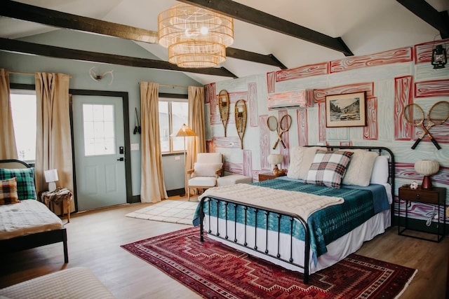 587 Lakes Rd, Tracy City, TN 37387 - bedroom with a chandelier, wood finished floors, and a wall mounted AC