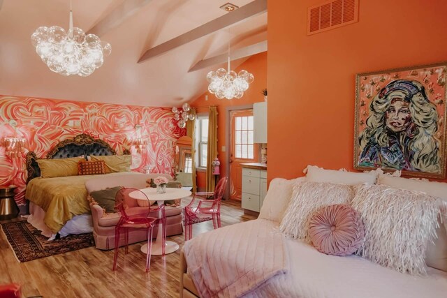 587 Lakes Rd, Tracy City, TN 37387 - bedroom with a chandelier and light wood finished floors