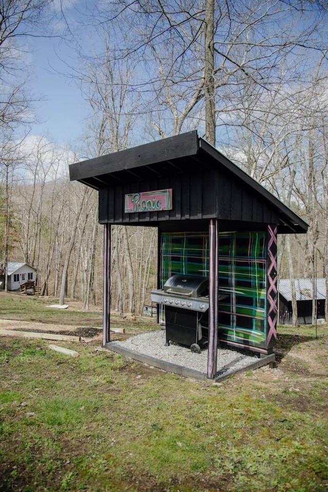 587 Lakes Rd, Tracy City, TN 37387 - view of outbuilding with a carport