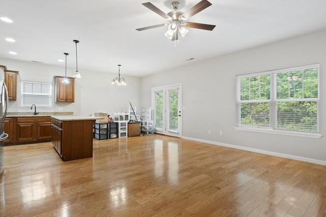 1190 Stonegate Cir NW, Cleveland, TN 37312 - kitchen with light wood-style floors, recessed lighting, baseboards, decorative light fixtures, and ceiling fan