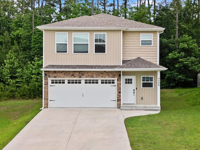 1190 Stonegate Cir NW, Cleveland, TN 37312 - view of front facade featuring concrete driveway, a front lawn, a shingled roof, and a garage