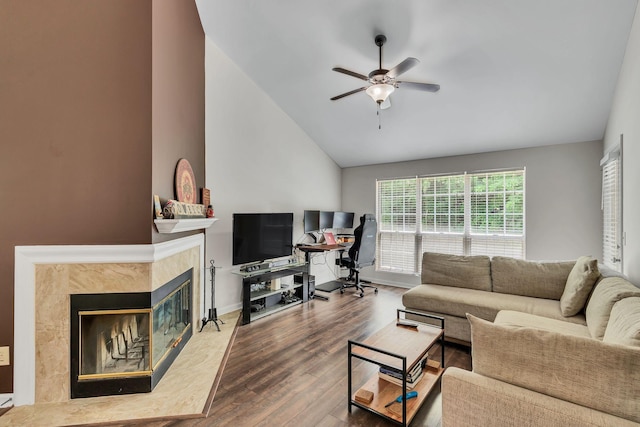 212 Post Creek Rd, Nashville, TN 37221 - living area featuring lofted ceiling, ceiling fan, wood finished floors, a tiled fireplace, and baseboards