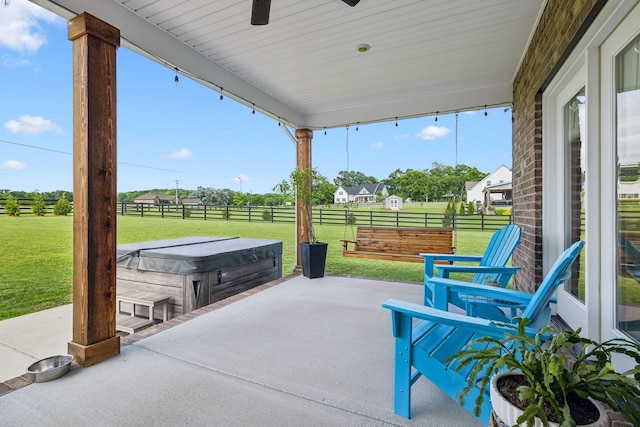 11769 Milton St, Milton, TN 37118 - view of patio / terrace with a hot tub and a ceiling fan