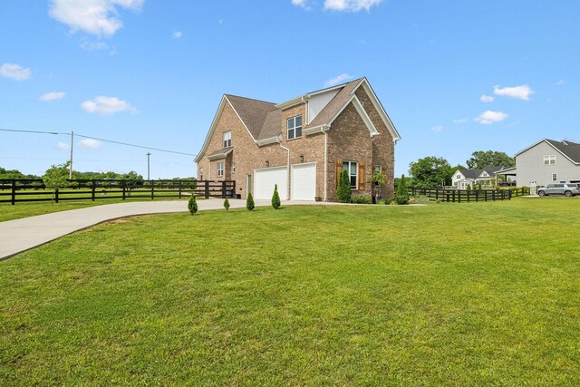 11769 Milton St, Milton, TN 37118 - view of side of home with driveway, a garage, and brick siding