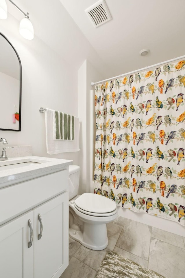 11769 Milton St, Milton, TN 37118 - full bathroom with marble look tiles, toilet, vanity, shower / bath combo, and vaulted ceiling