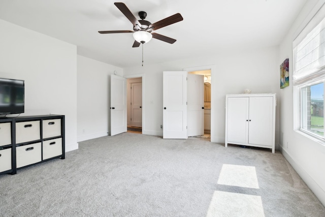 11769 Milton St, Milton, TN 37118 - unfurnished bedroom with carpet, baseboards, and a ceiling fan