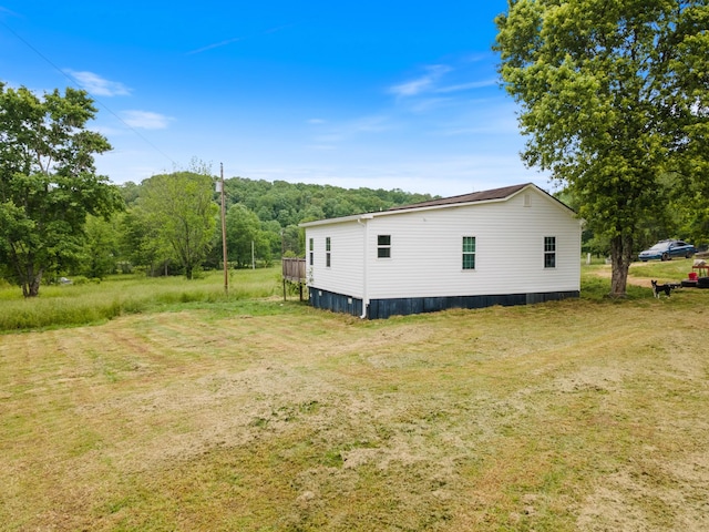 287 Rack Clayton Rd, Hohenwald, TN 38462 - view of side of property featuring a lawn