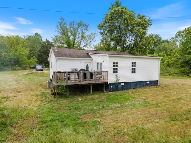 287 Rack Clayton Rd, Hohenwald, TN 38462 - rear view of property with a wooden deck