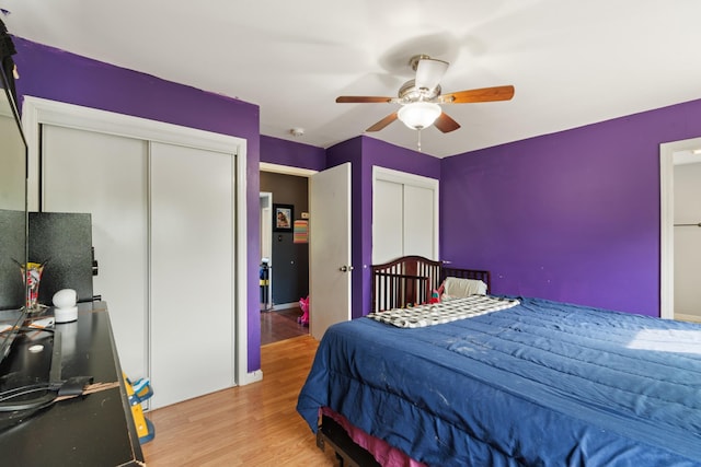 287 Rack Clayton Rd, Hohenwald, TN 38462 - bedroom featuring two closets, wood finished floors, and ceiling fan