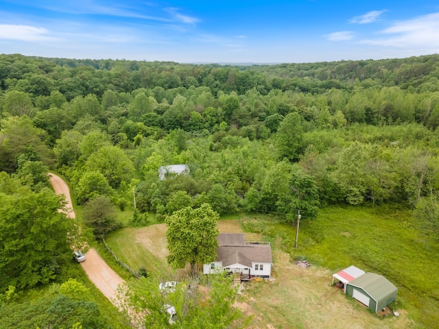 287 Rack Clayton Rd, Hohenwald, TN 38462 - view from above of property with a heavily wooded area