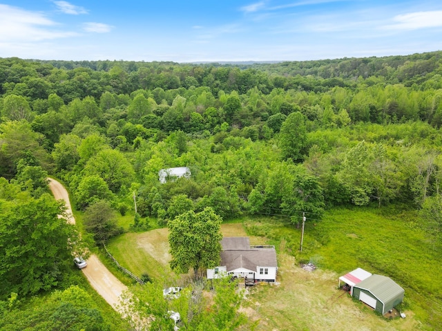 287 Rack Clayton Rd, Hohenwald, TN 38462 - view from above of property with a forest