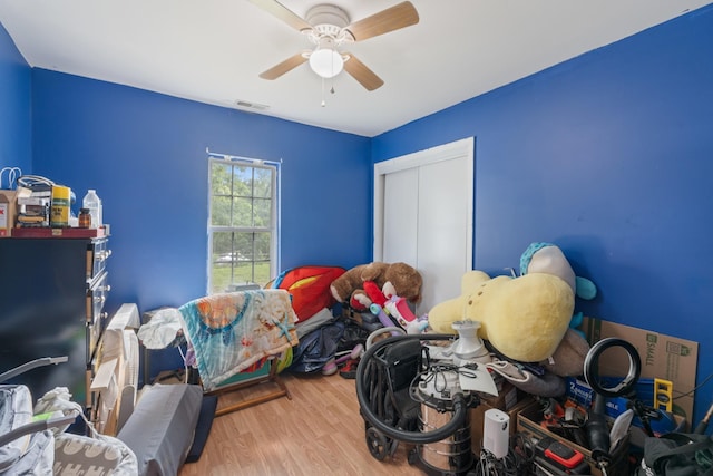 287 Rack Clayton Rd, Hohenwald, TN 38462 - bedroom with a closet, wood finished floors, and ceiling fan