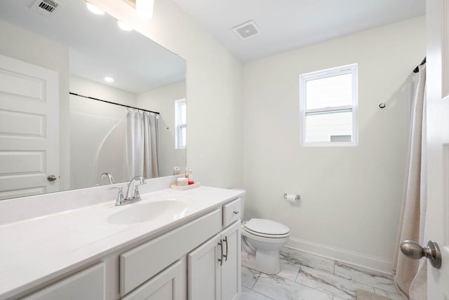 967 Nance Ln, Lebanon, TN 37087 - full bathroom with marble look tiles, vanity, toilet, and baseboards