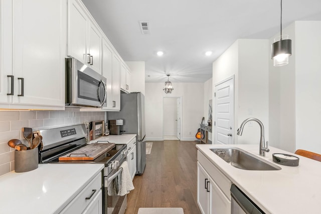 967 Nance Ln, Lebanon, TN 37087 - kitchen featuring appliances with stainless steel finishes, a sink, light countertops, white cabinets, and recessed lighting
