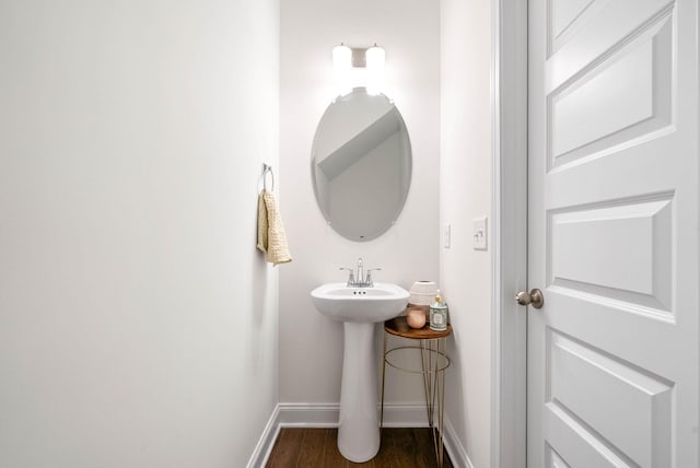 967 Nance Ln, Lebanon, TN 37087 - bathroom with baseboards, wood finished floors, and a sink