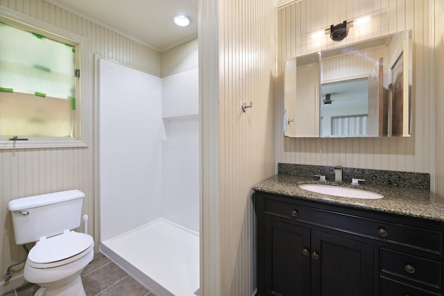 5904 S New Hope Rd, Hermitage, TN 37076 - bathroom featuring crown molding, vanity, toilet, tile patterned flooring, and a tile shower