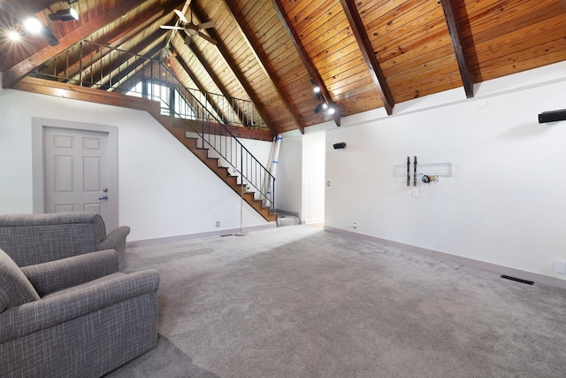 5904 S New Hope Rd, Hermitage, TN 37076 - unfurnished living room featuring wood ceiling with exposed beams, carpet, baseboards, stairs, and high vaulted ceiling