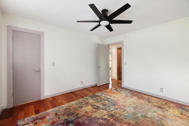 5904 S New Hope Rd, Hermitage, TN 37076 - empty room with wood finished floors, a ceiling fan, and baseboards